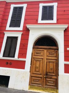 The facade or entrance of Empire Suites