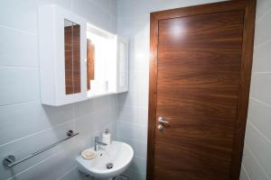 Koupelna v ubytování Apartment Zoya + 26 fotografií