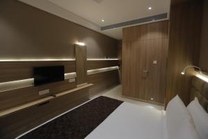 TV a/nebo společenská místnost v ubytování Hotel Radiance