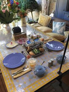 a table with plates of food on top of it at Herberg De Ring in Dreischor