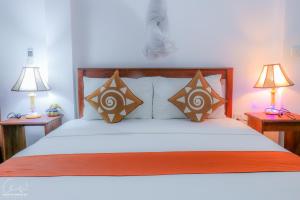 Letto o letti in una camera di Sigiri Heritage Villa