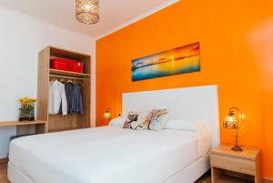 A bed or beds in a room at Vista Mare B&B