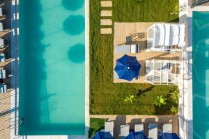 Bazén v ubytování T Hotel Premium Suites nebo v jeho okolí