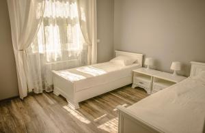 Кровать или кровати в номере Apartamenty Old town