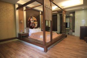 Postel nebo postele na pokoji v ubytování Romantic Code Art Motel