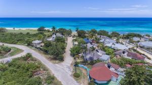 an aerial view of a resort with the ocean at Beach Palms Villa in Silver Sands