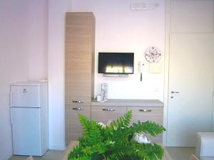 A television and/or entertainment centre at Cà Bianca