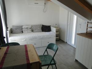 Postel nebo postele na pokoji v ubytování Mir Apartments