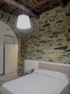 Postel nebo postele na pokoji v ubytování You & Me to 5 terre e La Spezia