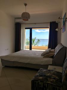 Postel nebo postele na pokoji v ubytování Ocean view + 37 fotografií