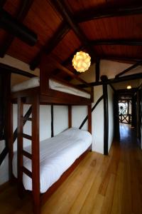 Postel nebo postele na pokoji v ubytování Sierra Alisos Hotel de Campo