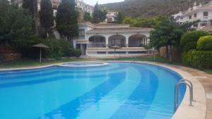 Bazén v ubytování Urbanización Cullera Park - Carmen y Jose nebo v jeho okolí