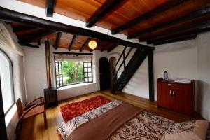 Postel nebo postele na pokoji v ubytování Sierra Alisos Hotel de Campo