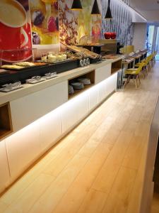 A restaurant or other place to eat at Hotel Miau