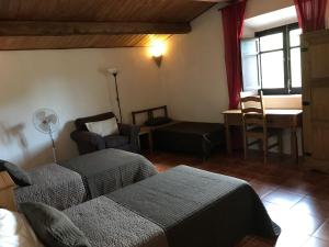 Posteľ alebo postele v izbe v ubytovaní Hotel Mas Pelegri