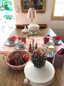 a table with food and other items on it at La Laiterie du Logis in Chaniers +35 photos