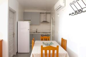 Kuchyňa alebo kuchynka v ubytovaní Apartamentos El Galán II + 18 fotografií