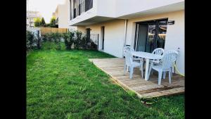 Κήπος έξω από το La Roseraie Toulousaine avec parking privé