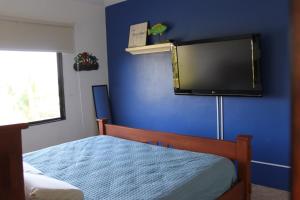 Katil atau katil-katil dalam bilik di Villa 24C Los Cabos Monterrico