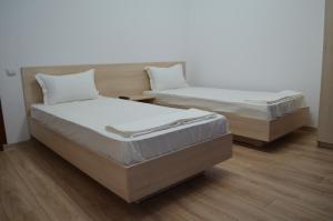 Een bed of bedden in een kamer bij Ermar