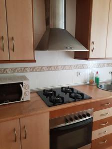 Kuchyň nebo kuchyňský kout v ubytování Apt a Calafell plage
