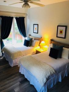 Postel nebo postele na pokoji v ubytování Hotel San Ramon