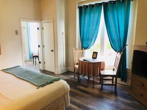 Postel nebo postele na pokoji v ubytování Hotel San Ramon