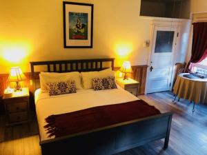 Postel nebo postele na pokoji v ubytování Hotel San Ramon