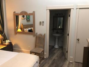 Postel nebo postele na pokoji v ubytování Hotel San Ramon