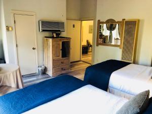 Postel nebo postele na pokoji v ubytování Hotel San Ramon