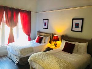 Postel nebo postele na pokoji v ubytování Hotel San Ramon