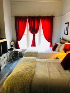 Postel nebo postele na pokoji v ubytování Hotel San Ramon