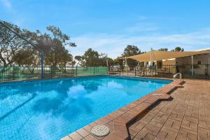 a large swimming pool at a resort at Port Broughton Tourist Park in Port Broughton