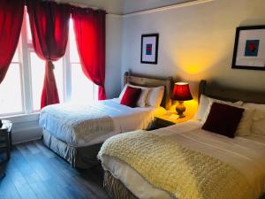 Postel nebo postele na pokoji v ubytování Hotel San Ramon