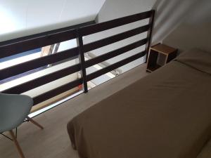 Voodi või voodid majutusasutuse Hôtel Point Bleu toas