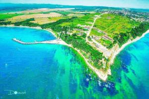 an aerial view of a island in the ocean at Guest House Dimi in Byala