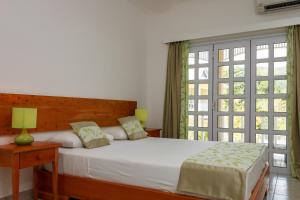 Voodi või voodid majutusasutuse Captain's Villa toas