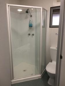 a shower in a bathroom with a toilet at Coonawarra Ensuite Unit A in Coonawarra