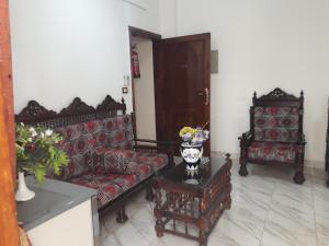 Posezení v ubytování Al Hambra Hotel