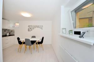 Kuchyňa alebo kuchynka v ubytovaní Pure Apartman Pécs