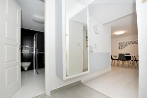 Kúpeľňa v ubytovaní Pure Apartman Pécs + 20 fotografií