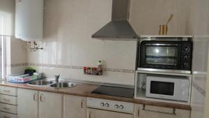Kuchyňa alebo kuchynka v ubytovaní Apartamento Orgaz