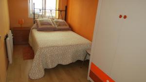Posteľ alebo postele v izbe v ubytovaní Apartamento Orgaz
