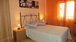 Posteľ alebo postele v izbe v ubytovaní Apartamento Orgaz