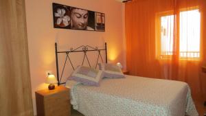 Posteľ alebo postele v izbe v ubytovaní Apartamento Orgaz