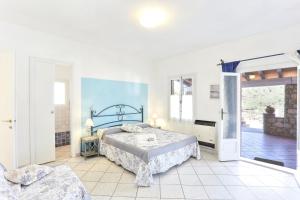 A bed or beds in a room at Rosa dei Venti