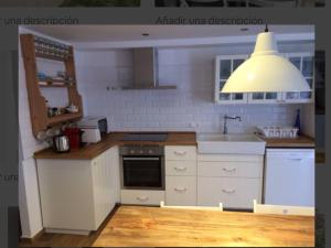 Kuchnia lub aneks kuchenny w obiekcie Beach apartment garden and wifi