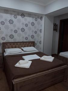 Postel nebo postele na pokoji v ubytování Guesthouse Fatima