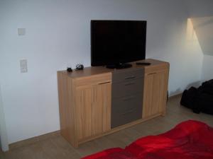 TV a/nebo společenská místnost v ubytování Zum-Luetten-Leuchtturm