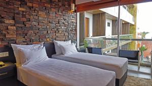 Postel nebo postele na pokoji v ubytování Hotel Sico + 37 fotografií